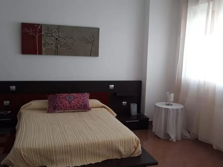 Slaapkamer van het Dakapartement in Algodonales, met restaurants, bars, supermarkten en winkels in de buurt. Ideaal gelegen op de route van de witte Andalusische dorpen