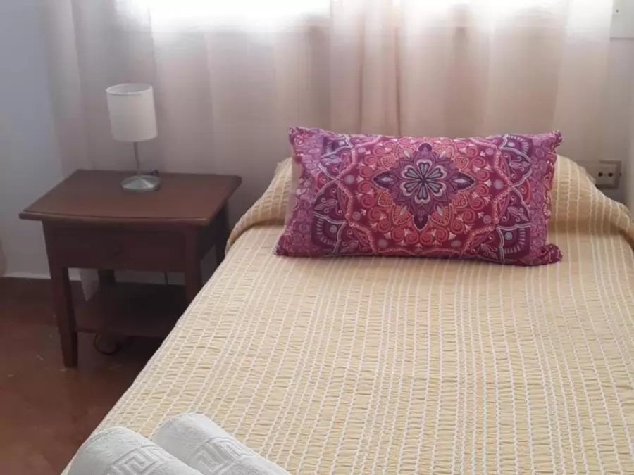 Slaapkamer van het Dakapartement in een witte andalusische dorp